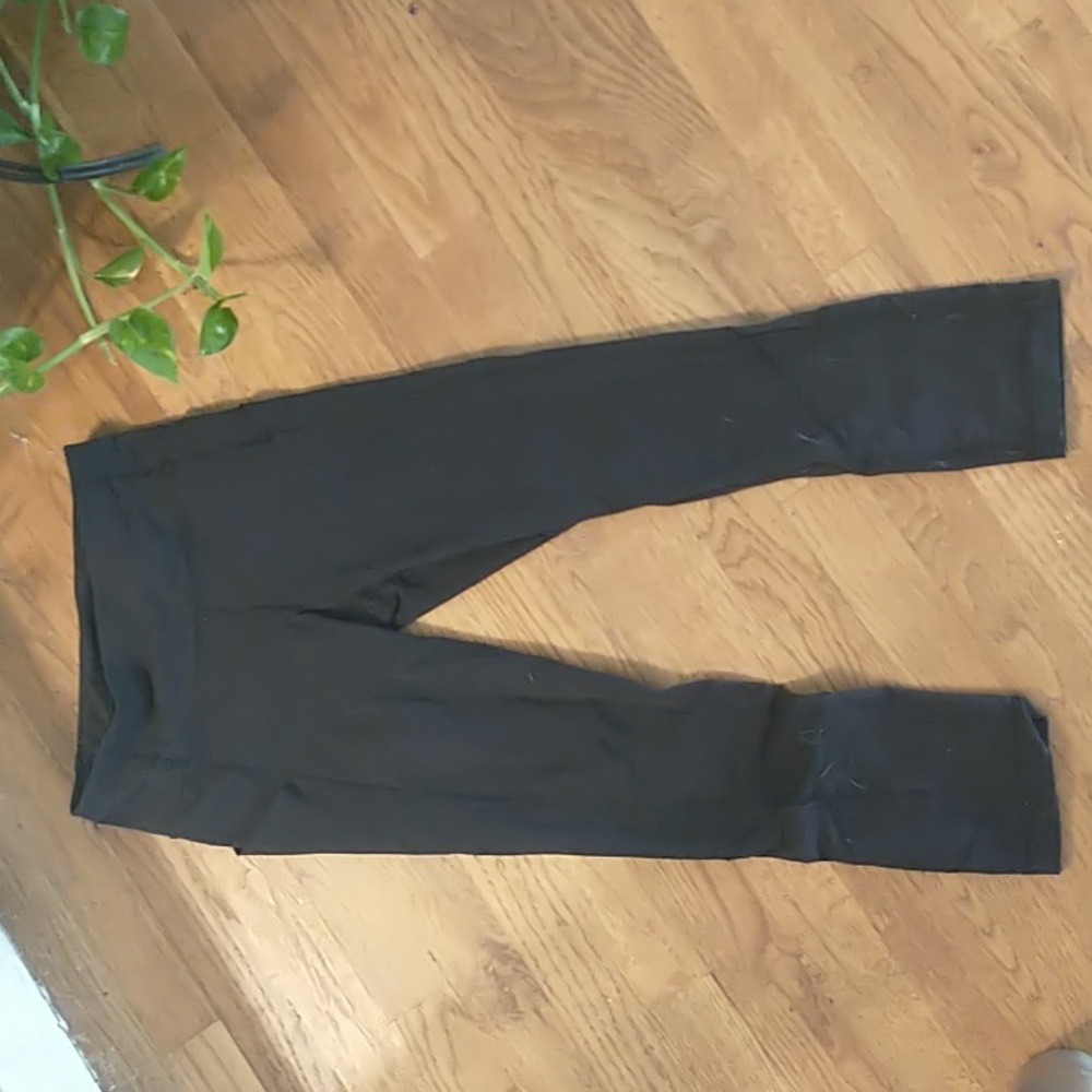 Lululemon black capris with mesh cut outs